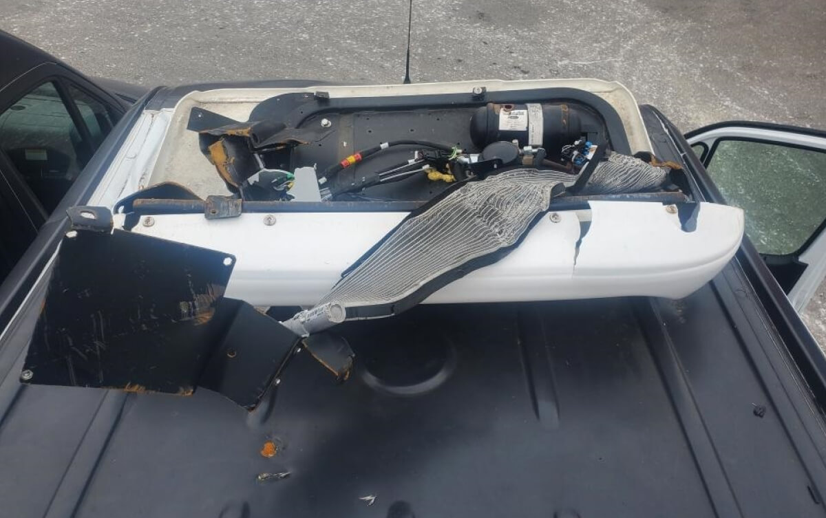 Roof strike damage near refrigeration mount
